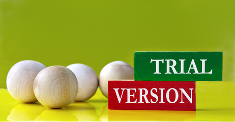 TRIAL VERSION - words on wooden colored blocks on a yellow background