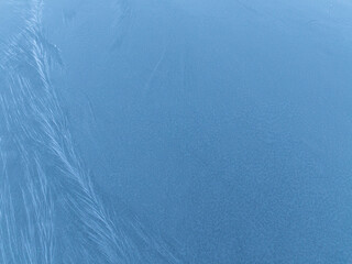 Subtle depths of blue - An abstract texture in calming shades of blue, offering a versatile and serene background for a variety of design and creative projects.  Evokes tranquility and subtle movement