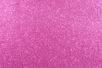 A pink background with glittery texture