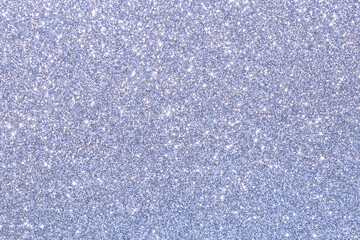 Obraz premium A blue background with glittery dots