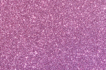 A pink background with glittery texture