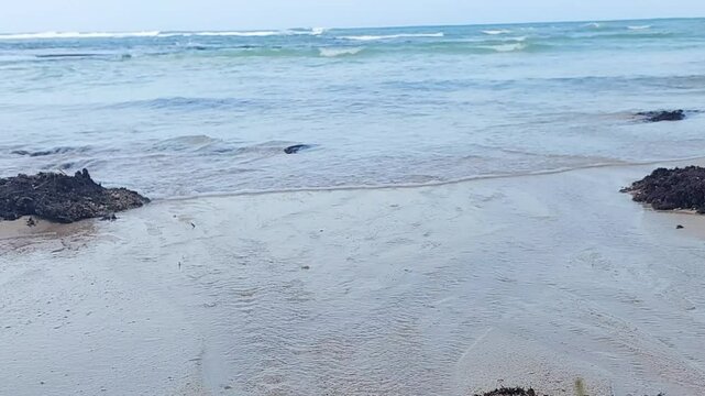 Enjoying the ocean view at Geger beach, Bali.