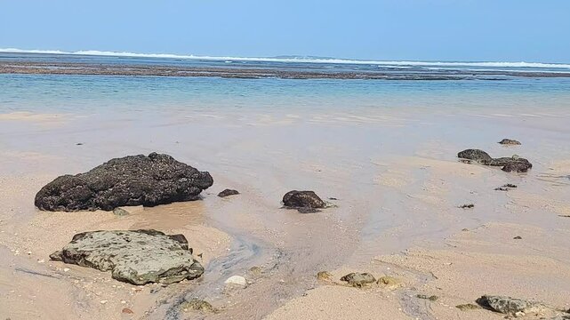 Enjoying the ocean view at Geger beach, Bali.