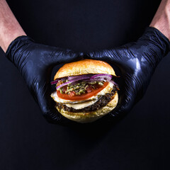 man holding a burger