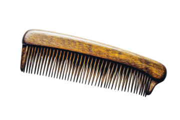 A beautifully crafted wooden comb showcases its fine design on a smooth surface isolated on transparent background