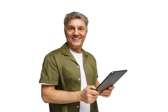 Mature man with gray hair smiles while holding a tablet in a bright, minimalistic setting