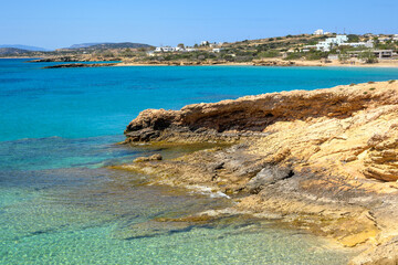 Fototapeta premium Koufonisia Fanos beach with clear water and rock formations. The south of Koufonisi. Small Cyclades, Greece
