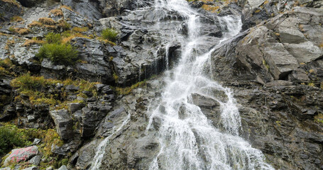 Front view of Capra waterfall in Fagaras mountains, Romania