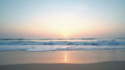 Fototapeta premium A serene ocean shore at sunrise with soft pastel skies, gentle waves washing onto the sandy beach, evoking a sense of quiet reflection.