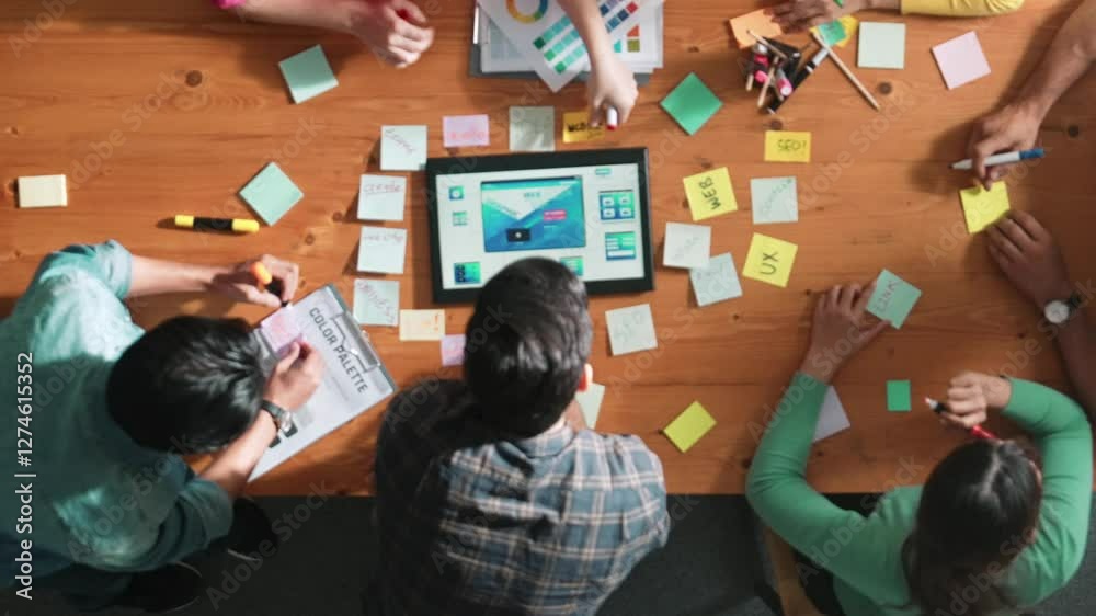 Poster top view of skilled business people working together to design web design. aerial view of designer b