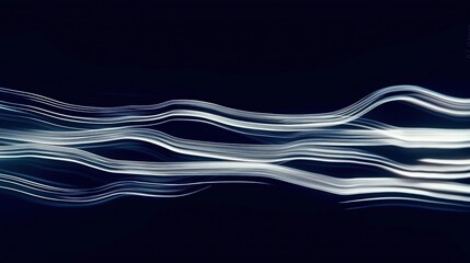 Obraz premium Abstract light trails curve sinuously across a dark background creating a mesmerizing and dynamic visual effect blending motion with illumination