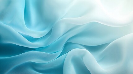 Fototapeta premium Soft blue fabric draping elegantly under diffused light