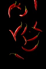 Red Chili Peppers Falling Dark Background Food Photography