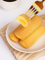 Yummy role cakes on a plate