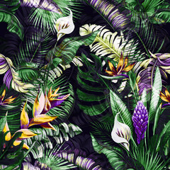 Fototapeta premium Lush tropical pattern with exotic flowers and palm leaves on a dark background. Vibrant, detailed, seamless repeat.