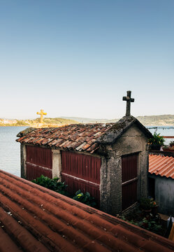 Traditional stone horreo granary with cross