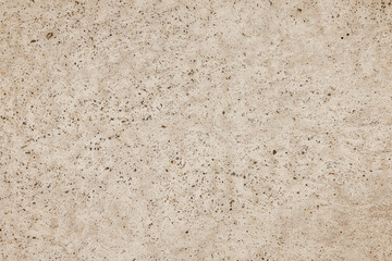 Seamless speckled beige texture for versatile backgrounds