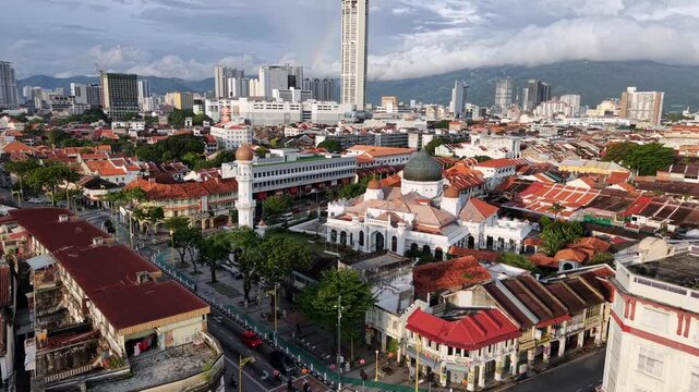 George Town, Penang, Malaysia aerial footage - Drone video of historic UNESCO city centre old town with colonial architecture including Kapitan Keling Mosque