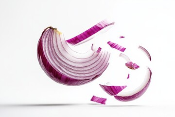 Sliced red onion pieces suspended in mid-air against a clean white backdrop isolated on transparent background