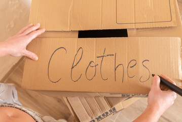 Organizing Clothes, Labeling a Moving Box for Packing