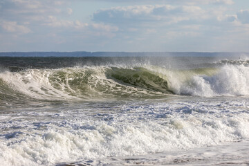 waves breaking on the shore