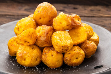Fried Creole potatoes with salt, very popular in Latin American cuisine - Solanum phureja.