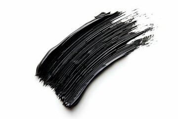 Black mascara stroke on white. Makeup product swatch. Beauty ads
