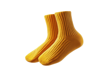 Cozy yellow socks suspended in mid-air, casting playful shadows on a bright background isolated on transparent background