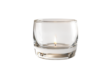 A tranquil candle burns softly in a clear glass holder, casting gentle light in a serene setting isolated on transparent background