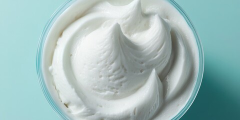 A delicious and wholesome dairy product served in a convenient plastic container.