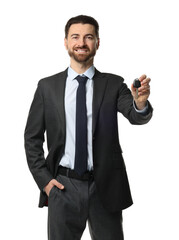 Cheerful salesman with car key on white background