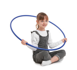 Cute little girl with hula hoop on white background