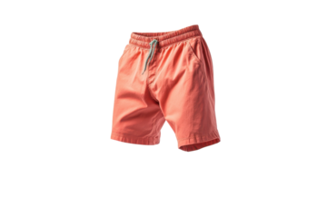 Bright coral swim shorts floating gracefully against a light backdrop in a minimalist setting isolated on transparent background