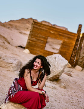 A girl in a good moode on a holiday trip, in Sahara