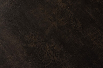 Sleek decorative plaster wall with a smooth, vintage-style textured surface.