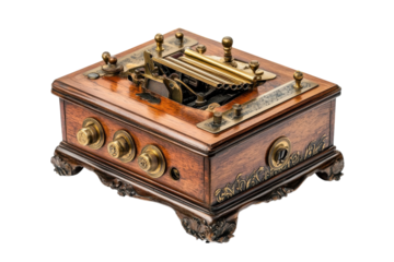 An intricate vintage telegraph machine from the late 19th century sitting on a white surface isolated on transparent background