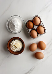 Zutaten für Kuchen auf Marmortisch

