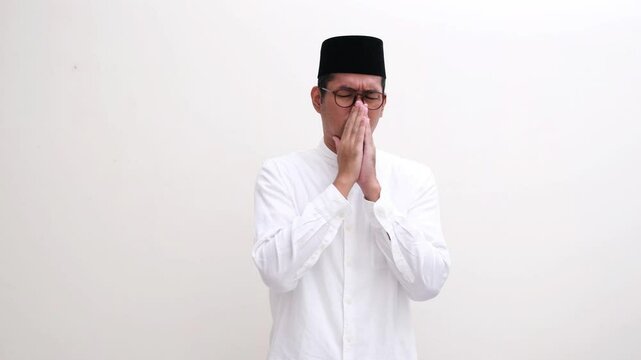 Muslim man having bad smell breath during fasting period