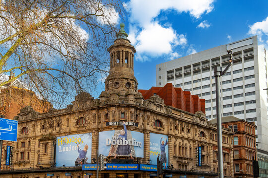 The Shaftesbury Theatre surrounded by office buildings and trees on the westside in London England UK