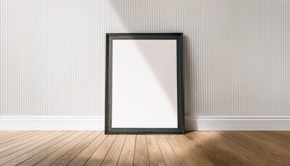 Stark and Minimalist Vertical Black Poster Frame Standing atop a Warm Wooden Floor, Set Against a Pristine White Wall Perfect for Modern Art, Home Decor, or Design Inspiration