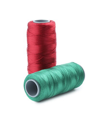 Spools of bright sewing threads isolated on white