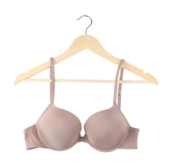 Beautiful beige bra on hanger against white background