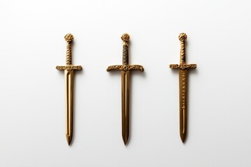 Three gold swords on a white background
