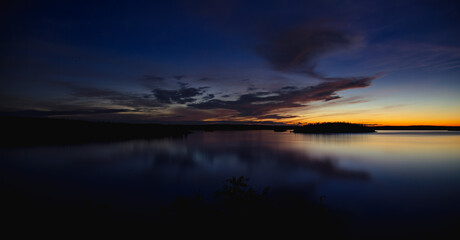 Fototapeta premium sunset over the lake