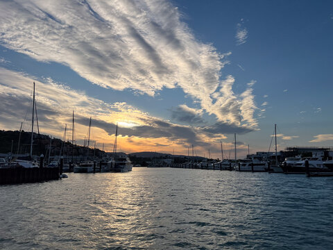 Dramatic sunset sky over Shute Harbour Marina Resort Queensland Australia