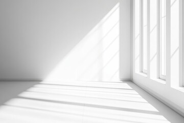 Fototapeta premium Sunlight streams through modern windows in a minimalist white room, ideal for design mockups