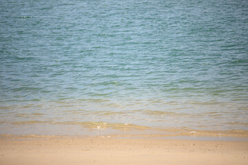 Close up shot of seawater under daylight showing gradient of blue colours. Abstract background. Beauty in nature. Environmental conservation.