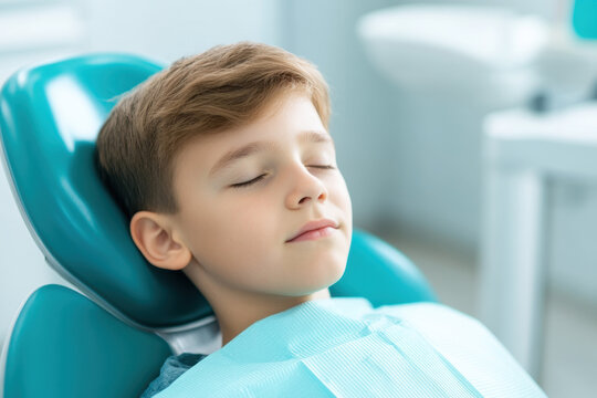 young boy is resting in dental chair, eyes closed, feeling calm and relaxed during dental visit. serene environment helps ease his anxiety
