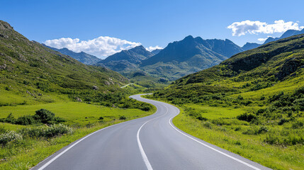 Naklejka premium scenic mountain pass with winding roads surrounded by lush greenery