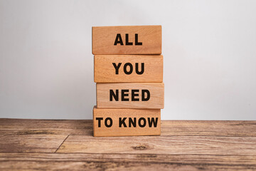 all you need to know words text symbol on wooden blocks on white background